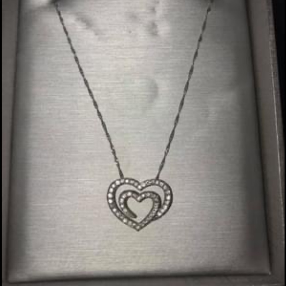 Zales 2 Heart Diamond, white gold Pendant. Originally paid $1200, worn 2 twice.